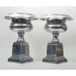 PAIR OF 20TH CENTURY CHROME CAMPANA SHAPED URNS