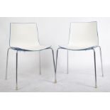 MANNER OF HERMAN MILLER - PAIR OF CONTEMPORARY PLASTIC CHAIRS