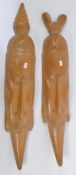 PAIR OF 20TH CENTURY CARVED TRIBAL WALL HANGING MASKS