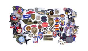 LARGE COLLECTION OF ASSORTED MILITARY CAP BADGES