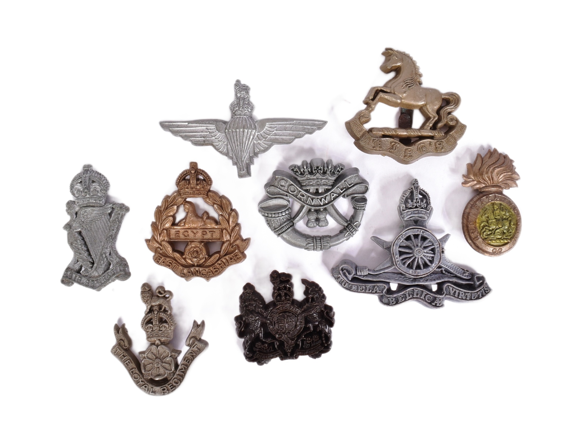 COLLECTION OF WAR TIME ECONOMY CAP BADGES