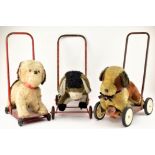 THREE VINTAGE 20TH CENTURY PUSH ALONG DOG TOYS