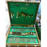 A twelve-place-setting canteen of gilt metal cutlery by S. Samran, Thailand Co. Ltd, in fitted