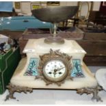 A French white marble mantel clock surmounted with gilt metal bowl, the dial with gilt metal leaf