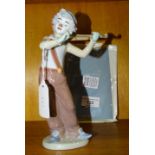 A Lladro Utopia 'Bohemian Melodies' figure of a violinist with bow, 20cm high, (in original box).