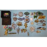 Thirty various costume jewellery brooches, mainly flowers, animals, etc.