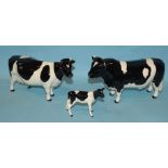 A Beswick Friesian Bull 'Ch. Coddington Hilt Bar', a Friesian cow 'Ch. Claybury Leegwater', (chip to