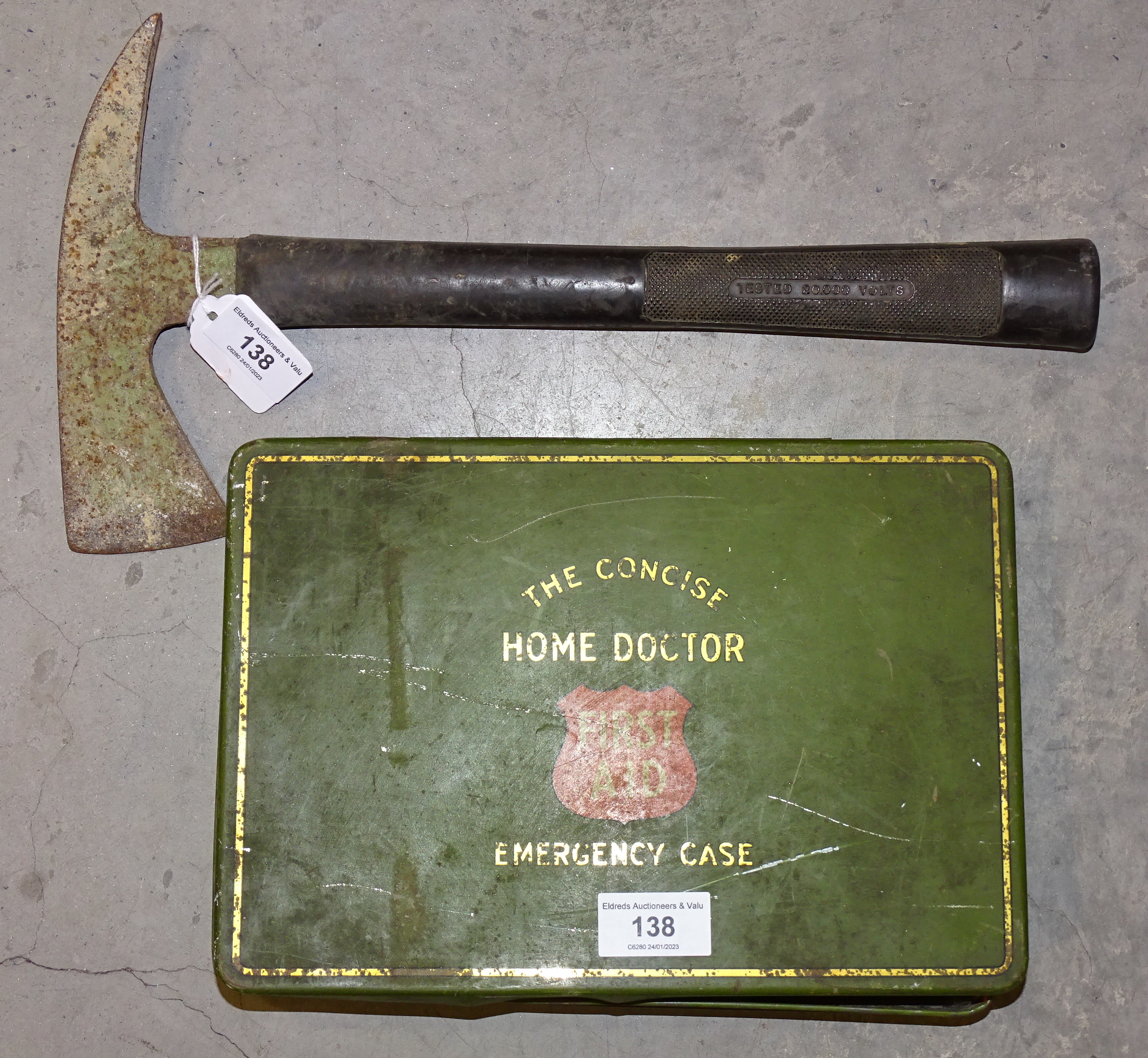 A No.125 fireman's-type axe with 20,000 volts insulation to handle, together with The Concise Home