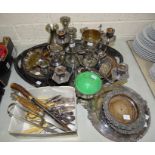 A plated oval tray, 66 x 43cm, a four-branch candelabrum, two pairs of candlesticks, three