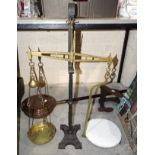 A large brass and iron scale to weigh 7lbs, with brass weight, pan and ceramic tray.