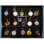 Sixteen modern pocket watches in a display case.