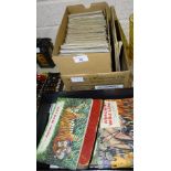 A collection of various cigarette and tea cards in albums and loose, a quantity of postcards and