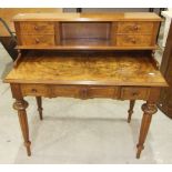 A late-19th century Continental walnut dressing table, the superstructure with four small drawers,