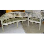 A curved teak garden bench, 160cm wide, 86cm high and a matching chair, both with Indonesian Legal