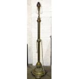 An early-20th century brass telescopic oil lamp stand with reeded column, on circular base, (