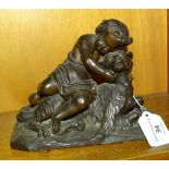 Unsigned, a bronzed metal sculpture of a young girl cuddling a dog, on rectangular base, 15.5cm