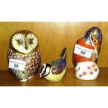 Three Royal Crown Derby paperweights: Barn Owl, Kingfisher, (repaired) and Blue Tit, all gold stoppe