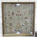 A framed mid-19th century sampler decorated with script, flowers and animals, by Janet Arnot? aged