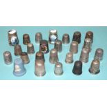 Sixteen silver thimbles, including two by Charles Horner and nine other thimbles, (25).