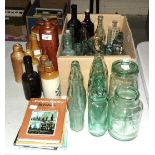 A stoneware 'Dorset Mineral Water Company, Poole' ginger beer bottle, another 'H Gould's Home Brewed