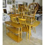 Four Ercol 'Goldsmith' beech and elm dining chairs, an Ercol dining table, 151 x 77cm, (gnawed on
