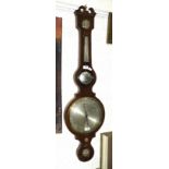 An early-19th century mahogany banjo barometer with silvered dry/damp, thermometer and barometer