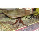 A Georgian mahogany tilt-top breakfast table, on quadruped feet with brass castors, 112 x 137cm.