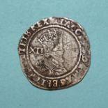 A James I hammered silver shilling.