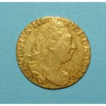George III gold guinea 1775, 4th portrait, 24mm diameter, 8.4g.