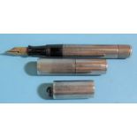 A Watermans Ideal white metal fountain pen, model 472 ½V, 10cm long, 16.5cm long when extended.