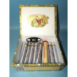 Eleven Romeo Y Julieta "Romeo No.1" cigars in tubes and one Montecristo cigar in tube, all in a
