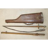 A Victorian leather leg o' mutton 12-bore shotgun case, a Victorian officer's dress sword, (in