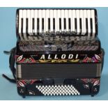 A Fantini Studio Allodi accordion with 34 treble keys and 72 bass, full diamanté decoration on black