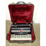 A Baile 120 Bass piano accordion, in case and a modern concertina, in case, (2).