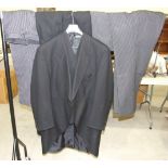 A Brook Taverner herringbone morning coat, size 48 short, two herringbone waistcoats, three pairs of