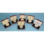 Pobjoy Mint, a collection of six Isle of Man cased silver crowns with certificates of