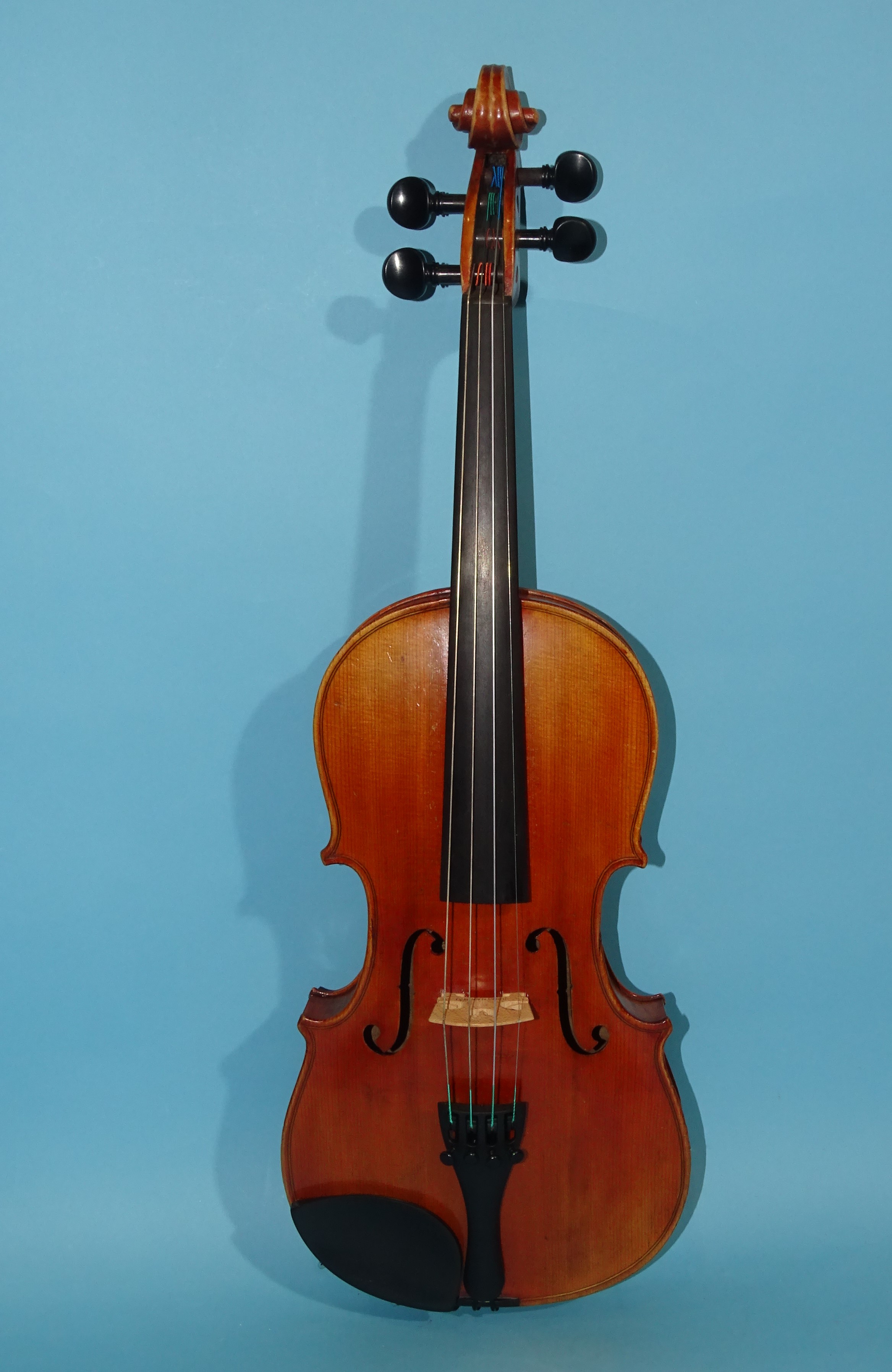 A 20th century ¾-size violin Stradivarius label, with bow, in case.