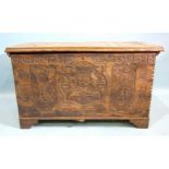 A 20th century hardwood coffer chest, the front carved with heraldic symbols, Bath "Tempus Fugit",