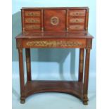 A late-19th century French Empire-style ormolu-mounted ladies' writing desk, the upper part fitted