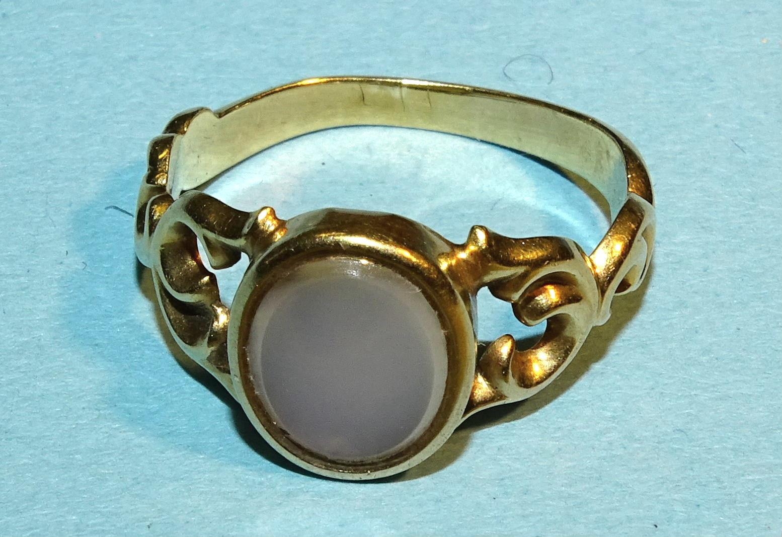 A gold signet ring set chalcedony, (no carving, tests as 18ct approximately), size J½, 2.8g.