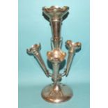 A George V silver epergne having a central trumpet-shaped flute flanked by three smaller flutes,