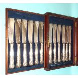 A set of twelve Victorian silver-bladed and loaded silver-handled fish knives, London 1857, makers