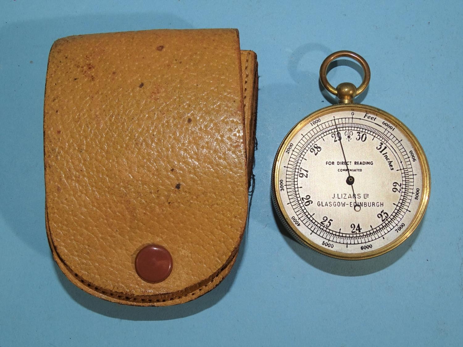 A compensated pocket barometer by J Lizars Ltd, Glasgow-Edinburgh, with silvered dial and brass