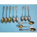 A set of six Russian silver teaspoons with engraved and enamelled decoration and gilt bowls,