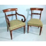 A set of eight early-19th century mahogany dining chairs, each with curved and centre bar, on turned
