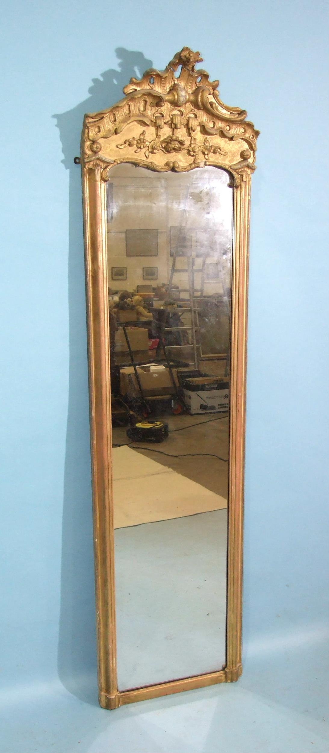 A 19th century tall gilt pier mirror, the moulded frame surmounted by Chippendale-style gesso - Image 2 of 3