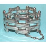 A silver gate-link bracelet with domed terminals to each hinge and concealed clasps, marked 925