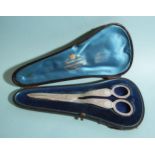 A pair of Victorian silver grape scissors with engraved decoration, (cased), John Aldwinckle &