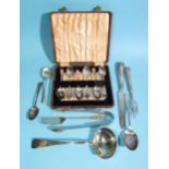 A William IV silver ladle, London 1831, maker Charles Boyton, six cased silver coffee spoons,