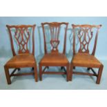 A pair of 19th century oak child's dining chairs, each with pierced splat back and drop-in seat,